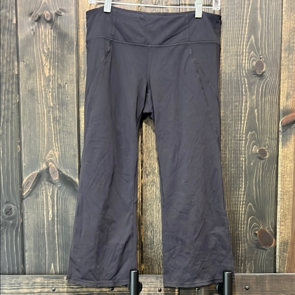 Athleta Kick‎ Flare Cropped Yoga Pants M Black Leggings Slit Hem Athleisure Gym